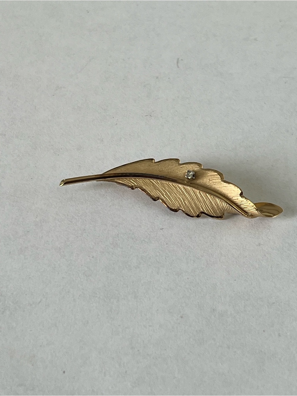Bond Boyd Gold Leaf shaped brooch pin with Clear Crystal Accent
